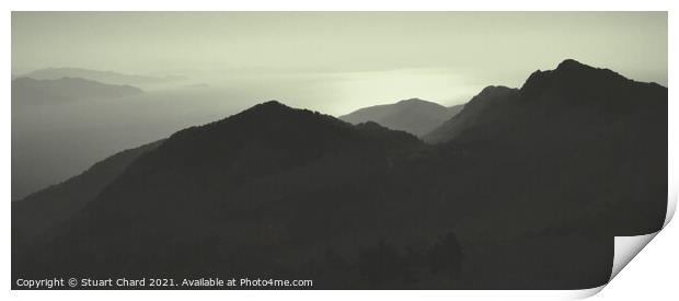 Sunset Over The Mountains Silhouette Of A Mountain Range Against The Sky Panorama Print by Stuart Chard