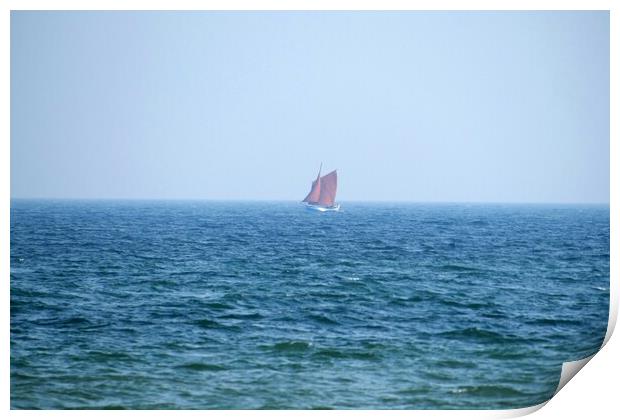 Lone red sailing boat Print by Roy Hinchliffe