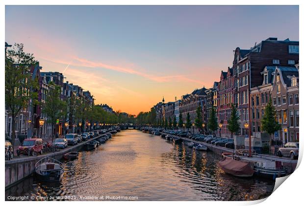 Buildings and boats along the canal at sunset time in Amsterdam, Netherlands Print by Chun Ju Wu