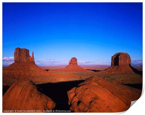 The Mittens and Merrick Butte at Sunset Monument Valley Print by Mark Sunderland