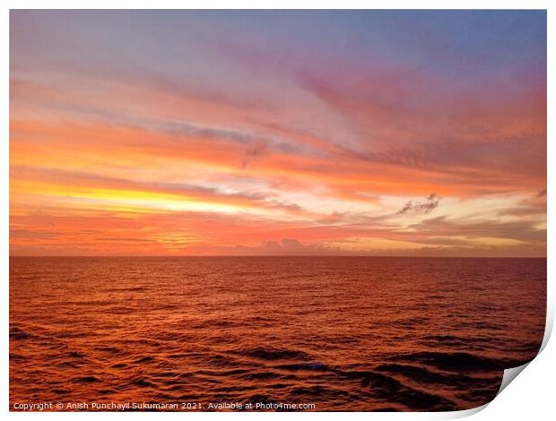 beautiful sunset in ocean and cloudy sky Print by Anish Punchayil Sukumaran