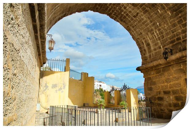 Famous Puente Nuevo Bridge's Arch in Ronda historic city center Print by Elijah Lovkoff