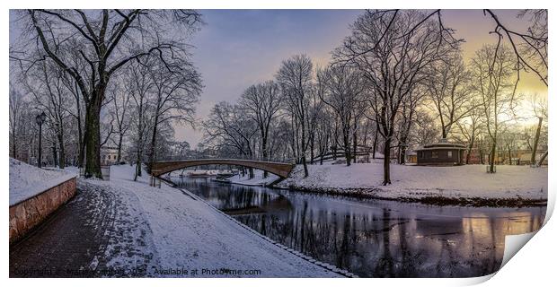 Sunset in snowy city park Print by Maria Vonotna