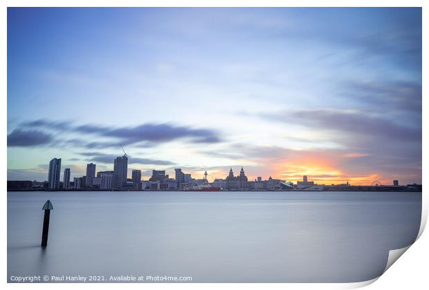 The sun rising over the skyline of Liverpool Print by Paul Hanley