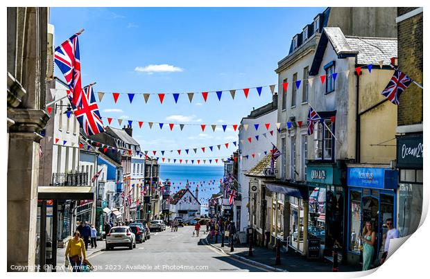 Broad Street Lyme Regis with bunting and union jack flags Print by Love Lyme Regis