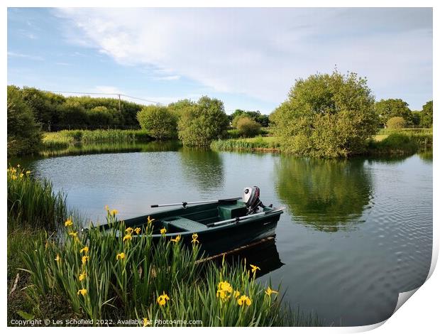 Lake and boat  Print by Les Schofield