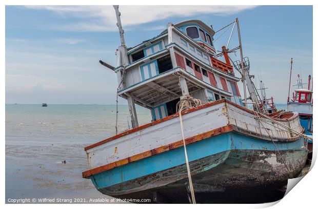 an old fishing boat in Thailand Print by Wilfried Strang
