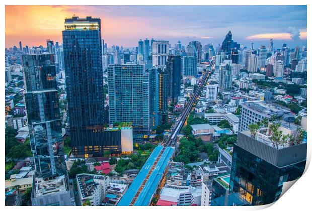 The Cityscape, the Railway of the Skytrain and the skyscraper of Bangkok in Thailand Southeast Asia at the Evening Print by Wilfried Strang