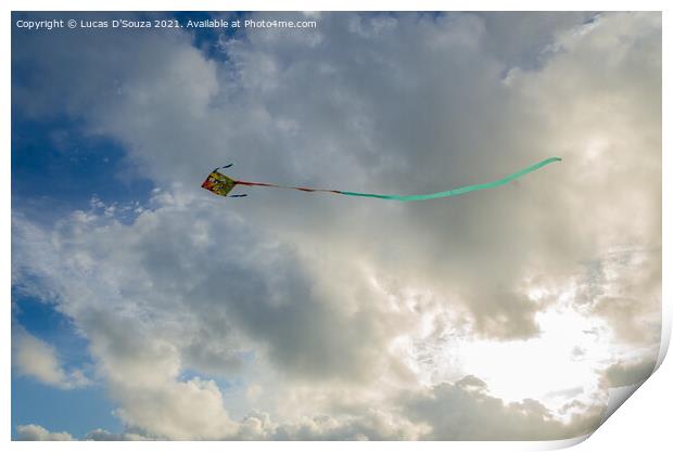 Kite flying against backdrop of beautiful clouds Print by Lucas D'Souza