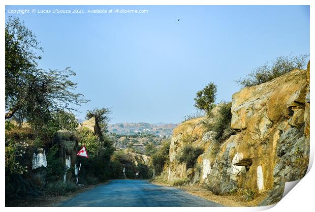 Village road through a rocky terrain Print by Lucas D'Souza
