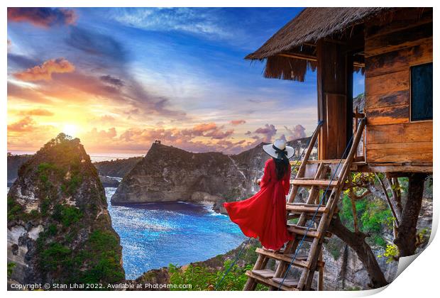 Young girl on steps of house on tree at sunrise in Nusa Penida  Print by Stan Lihai