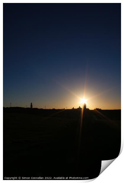 Sunlight through the Nash Point Lighthouse  Print by Simon Connellan