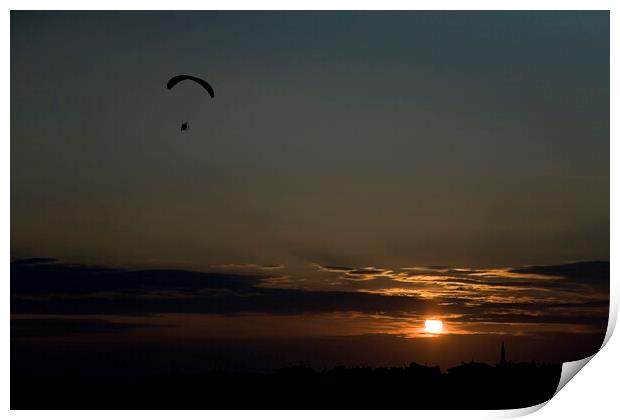 Powered paraglider pilot soars over the skyline of Istanbul at sunset Print by Gordon Dixon