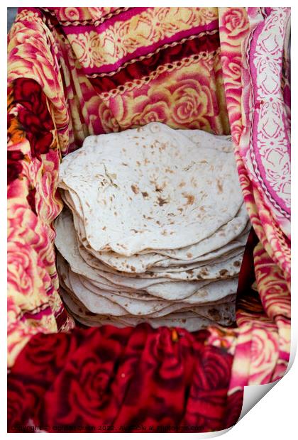 Turkish flatbreads for sale on a street market in Istanbul Print by Gordon Dixon