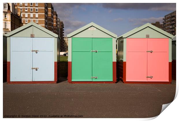 Three beach huts in pastel shades - Brighton Print by Gordon Dixon