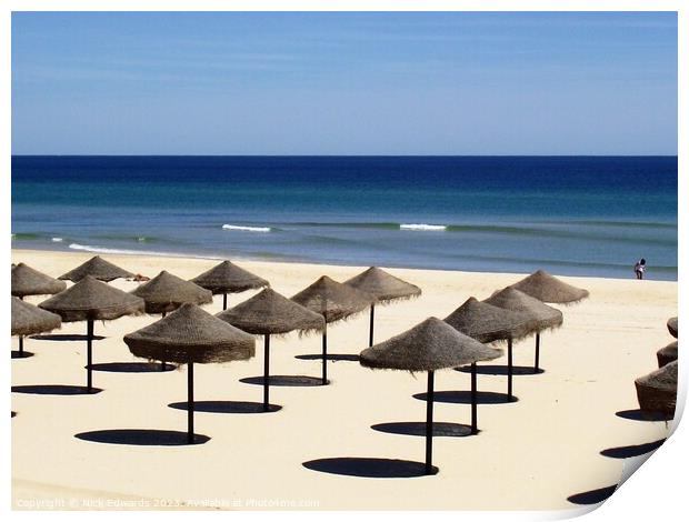 Algarve Beach Umbrellas in Rows Print by Nick Edwards