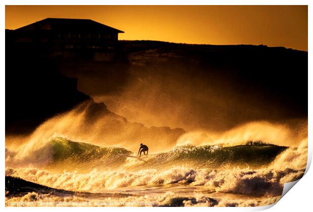 Surfing in wild seas during a golden sunset at Fis Print by Gordon Scammell