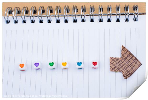 Love cubes and paper arrow on a notebook  Print by Turgay Koca