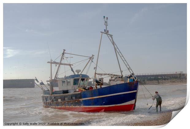 Fishing boat being landed on beach Print by Sally Wallis
