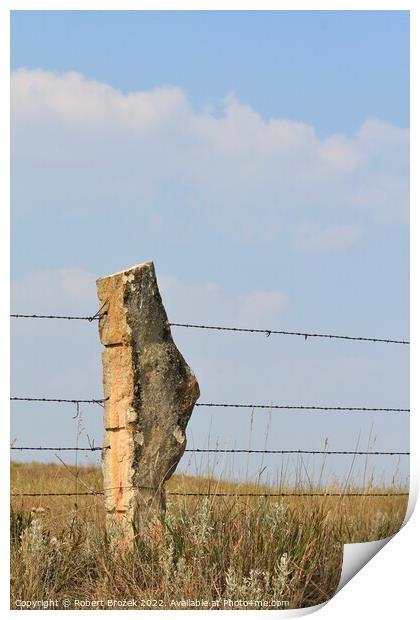 Stone Post fence with a field and blue sky Print by Robert Brozek