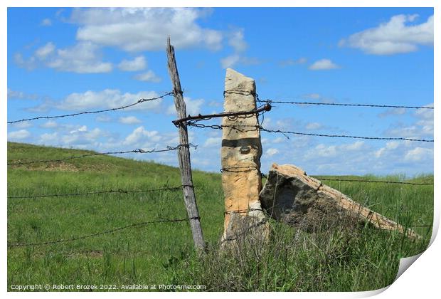 Outdoor stone post fence with grass Print by Robert Brozek