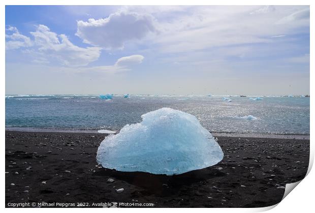 Diamond Beach in Iceland with blue icebergs melting on black san Print by Michael Piepgras