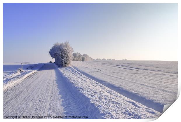 View of a snow-covered country road in winter with sunshine and  Print by Michael Piepgras