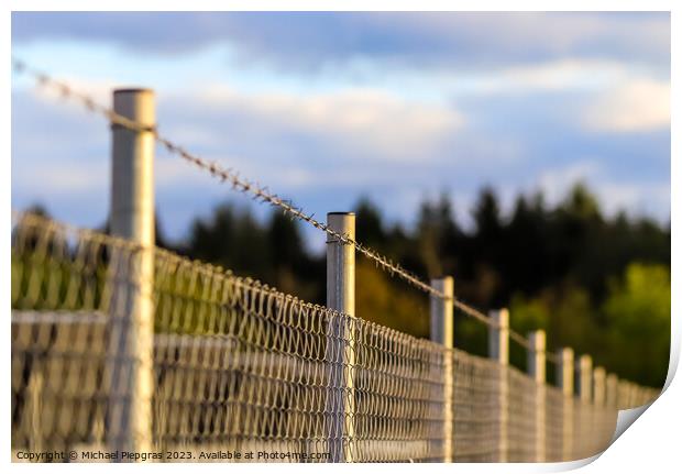 Barbed wire on with a soft focus bokeh in the background. Print by Michael Piepgras