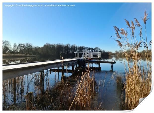 Beautiful landscape on a jetty by a lake with blue sky. Print by Michael Piepgras