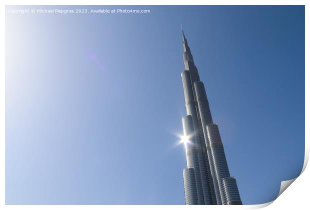 View at the Burj Khalifa on a sunny day. Burj Khalifa is currently the tallest building in the world, at 829.84 m (2,723 ft) Print by Michael Piepgras