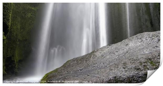 Long exposure of a waterfall in a rocky landscape in Iceland Print by Michael Piepgras