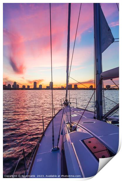 Sailing luxury yacht at sunset with cityscape view Print by Spotmatik 