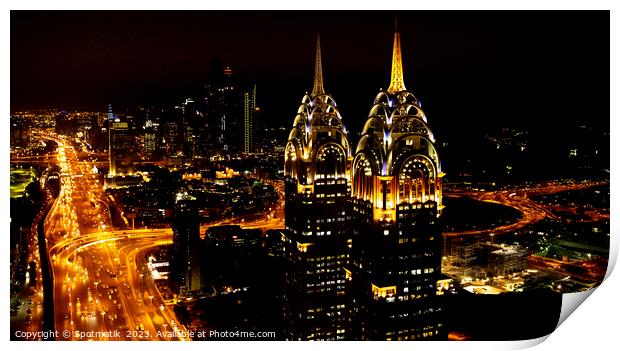 Aerial illuminated Downtown night view of Dubai UAE Print by Spotmatik 