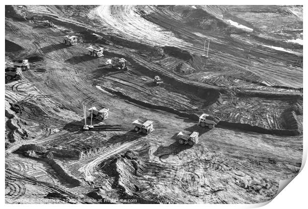 Aerial view giant dump trucks carrying mined Oilsand  Print by Spotmatik 