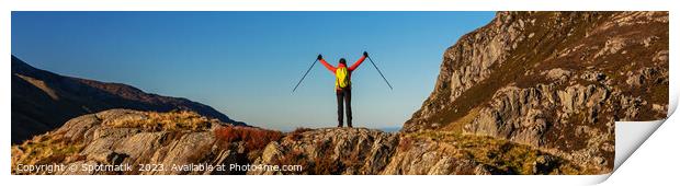 Panoramic happy female backpacker nearing mountain summit Print by Spotmatik 