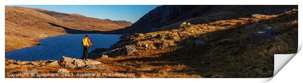 Panoramic lake among mountains with female hiker Snowdonia Print by Spotmatik 