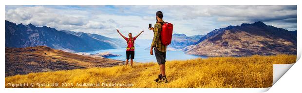 Panorama of young backpacking couple taking smartphone photo  Print by Spotmatik 