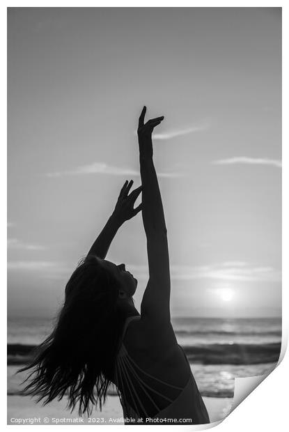 Bohemian girl enjoying carefree lifestyle dancing on beach Print by Spotmatik 