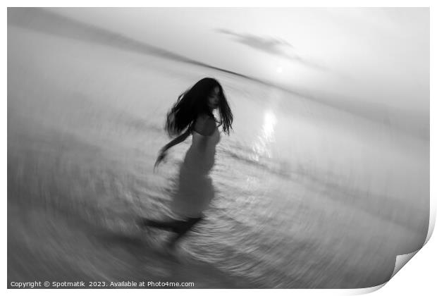 Motion blurred Asian girl dancing in ocean sunset Print by Spotmatik 