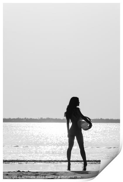 Tropical ocean sunrise with girl holding beach ball Print by Spotmatik 