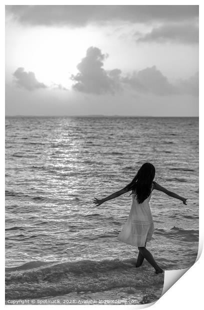 Asian female dancing in ocean waves at sunrise Print by Spotmatik 