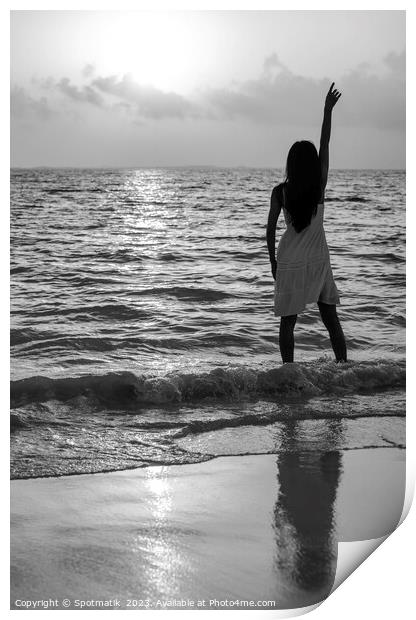 Young Asian woman enjoying ocean sunset on vacation Print by Spotmatik 