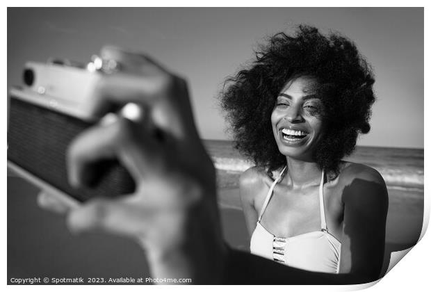 Laughing African American girl taking selfie on beach Print by Spotmatik 