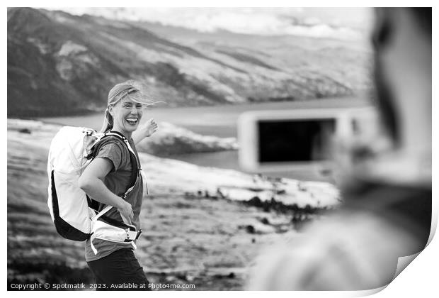 Young male taking picture of happy female Queenstown Print by Spotmatik 