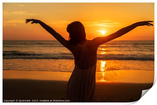Carefree Bohemian girl dancing on beach at sunset Print by Spotmatik 