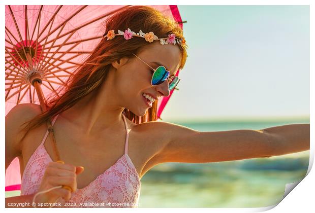 Hippy chic in sunglasses by ocean with parasol Print by Spotmatik 