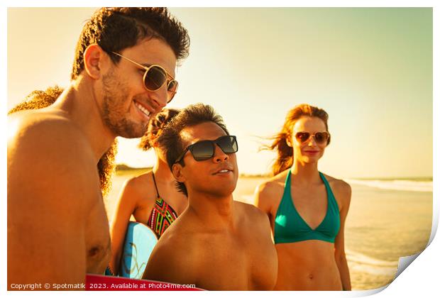 Friends on beach going bodyboarding on Summer vacation Print by Spotmatik 