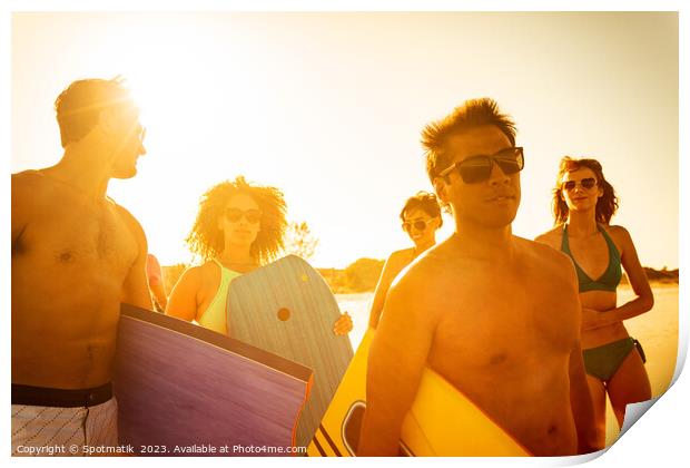 Friends in swimwear carrying bodyboards enjoying Summer vacation Print by Spotmatik 