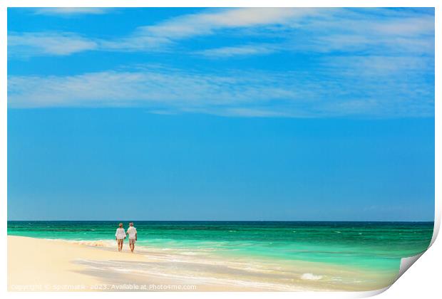 Mature couple walking along shoreline at beach resort Print by Spotmatik 