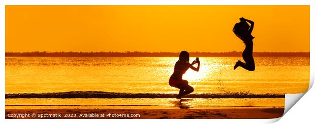 Panoramic ocean sunrise with girl jumping for photo Print by Spotmatik 